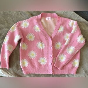 Semi crop pink daisy cardigan.